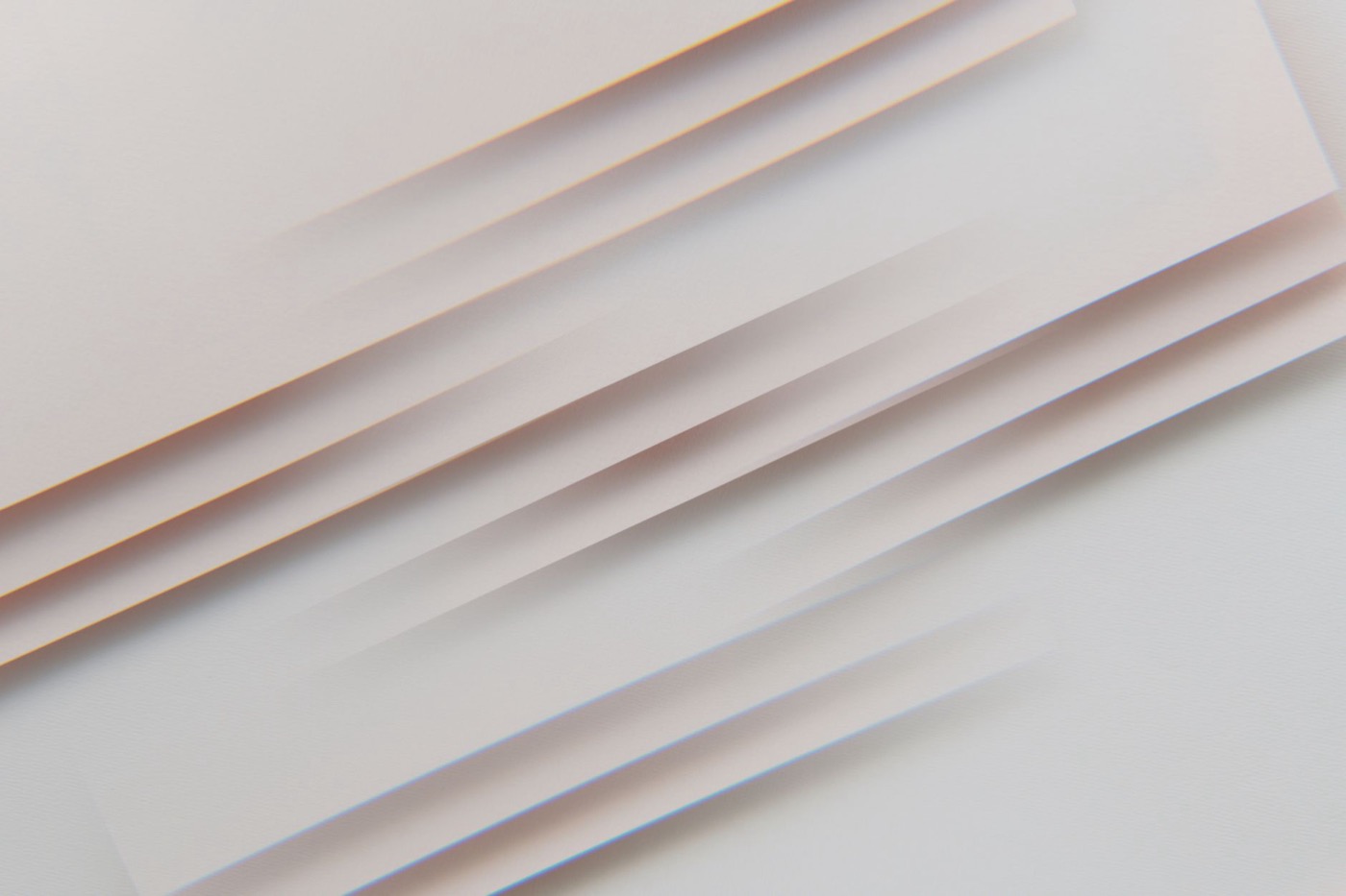 Abstract image with soft light and shadows featuring a minimalist paper pattern design.